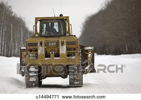 Stock Image - snow, winter, road, covered, bulldozer. Fotosearch