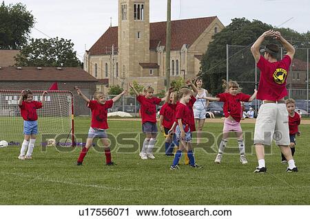 Stock Image - soccer, exercising, age, team, girls. Fotosearch