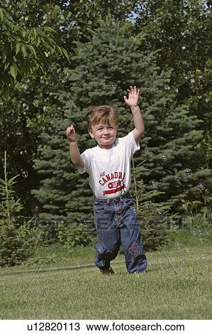 southern, boy, scenic, lawn, running, young View Large Photo Image Stock Image - southern, boy, scenic, lawn, running, young. Fotosearch