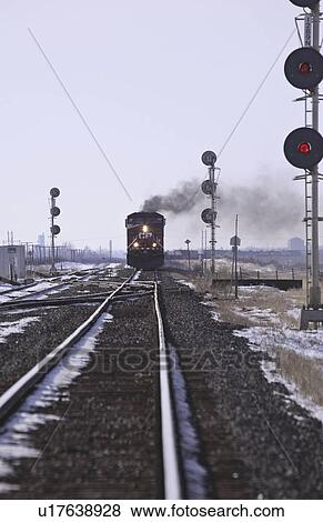 Stock Photo - spring, train, canada, saskatchewan, scenic, approaching. Fotosearch