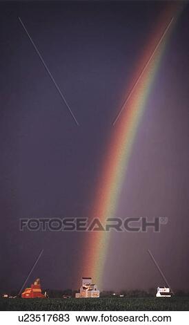 Stock Image - storm, grain, wheat, prairie, elevators, rainbow. Fotosearch