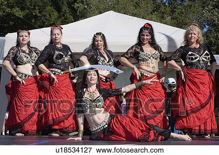 Stock Photo - sword, belly, balancing, one, dancers, group. Fotosearch