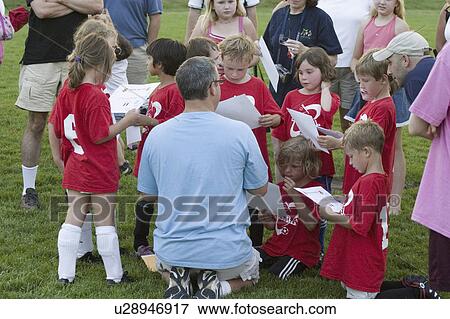 team, distributing, soccer, sheets, information, coach View Large Photo Image Stock Photo - team, distributing, soccer, sheets, information, coach. Fotosearch