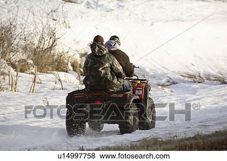 Stock Photo - terrain, spring, vehicles, riders. Fotosearch