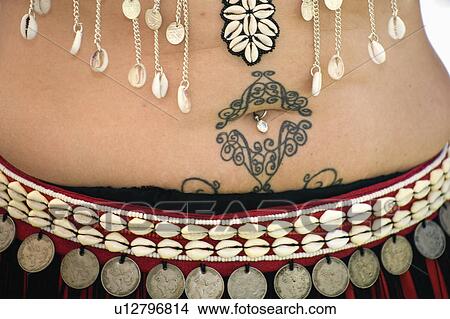 tummy, tattoo, belly, jewellery, navel, stomach View Large Photo Image Picture - tummy, tattoo, belly, jewellery, navel, stomach. Fotosearch