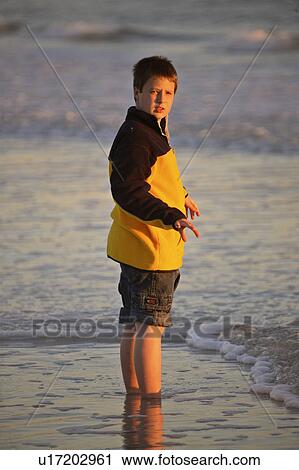 usa, enjoying, florida, scenic, beach, boy View Large Photo Image Stock Image - usa, enjoying, florida, scenic, beach, boy. Fotosearch