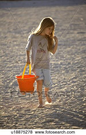 Stock Photo - usa, enjoying, florida, scenic, beach, girl. Fotosearch