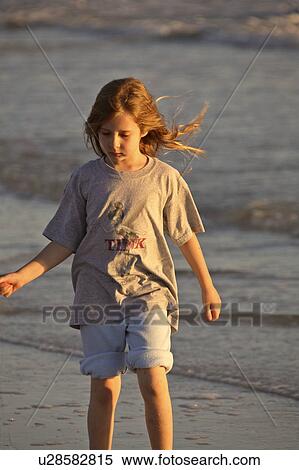 Stock Photography - usa, enjoying, florida, scenic, beach, girl. Fotosearch