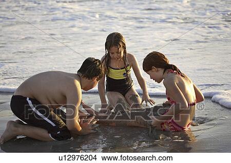 Stock Photo Of Usa Kids Florida Beach Enjoying Children Stock Photo Usa Kids Florida Beach Enjoying Children Fotosearch