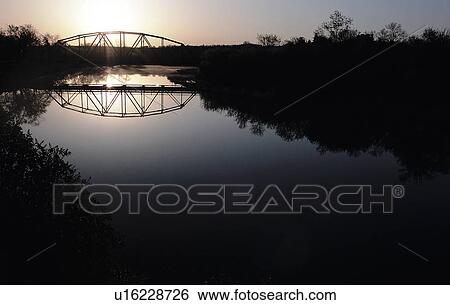 Stock Photograph - valley, sunrise, wakamaw, river, water, bridge. Fotosearch