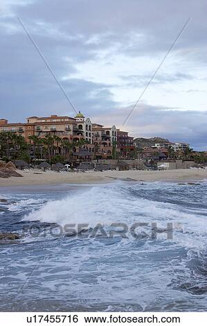 Stock Photograph - wave, cabos, beach, hotels, stormy. Fotosearch