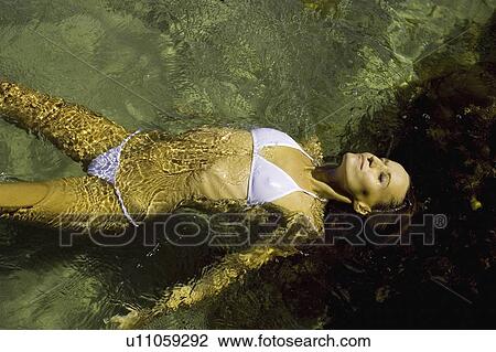 white, young, relaxing, female, woman, beautiful View Large Photo Image Stock Image - white, young, relaxing, female, woman, beautiful. Fotosearch