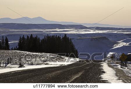 winter, snow, mountains, hills, distant, highway View Large Photo Image Picture - winter, snow, mountains, hills, distant, highway. Fotosearch