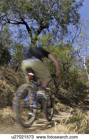 Stock Image - young, through, riging, male, active. Fotosearch