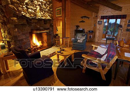 Lounge Room With Open Fire At The Rifflin Hitch Lodge In Southern