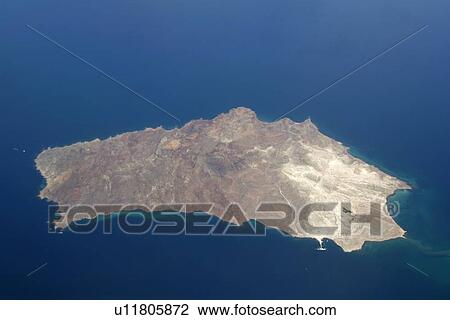 Stock Image - An aerial view of Isla San Marcos off the Baja Peninsula on the Gulf of California (Sea of Cortez) side. Baja California, Mexico. Note the dock and white gypsum mine operation on the lower (SW) side of the island.. Fotosearch