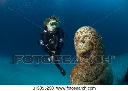 Stock Image - ATLANTIS sculpture park, Cayman Brac, Cayman Islands, Caribbean. Fotosearch