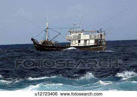 Commercial fishing vessel, St. Peter and St. Paul's rocks, Brazil, Atlantic Ocean View Large Photo Image Stock Photograph - Commercial fishing vessel, St. Peter and St. Paul's rocks, Brazil, Atlantic Ocean . Fotosearch