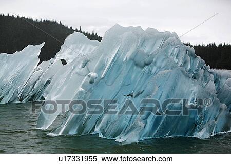 Stock Photography - Deeplly clear icebergs calved from the LeConte Glacier just outside Petersburg, Southeast Alaska, USA. Pacific Ocean.. Fotosearch