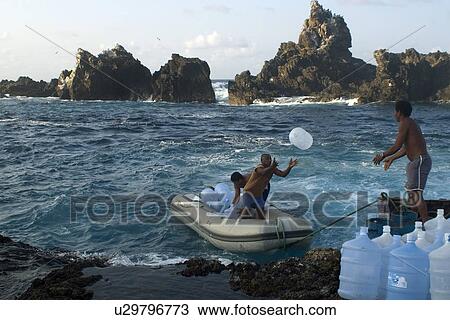 Fishermen transporting empty water containers, St. Peter and St. Paul's rocks, Brazil, Atlantic Ocean View Large Photo Image Stock Image - Fishermen transporting empty water containers, St. Peter and St. Paul's rocks, Brazil, Atlantic Ocean . Fotosearch