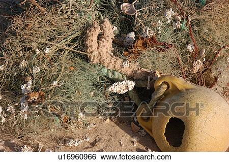 Fishing gear washed up on the beach, Southern Morocco View Large Photo Image Stock Photograph - Fishing gear washed up on the beach, Southern Morocco. Fotosearch