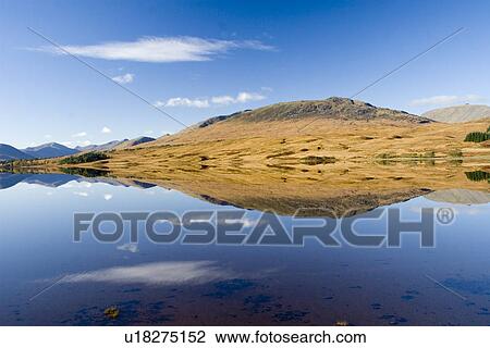 Stock Image - Freshwater loch. Black Mount by Rannoch Moor near Glencoe, Scotland.. Fotosearch