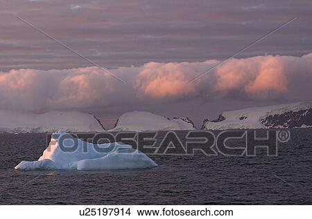 Gerlache Strait under the spell of the endless Antarctic sunset, Antarctic Peninsula View Large Photo Image Picture - Gerlache Strait under the spell of the endless Antarctic sunset, Antarctic Peninsula. Fotosearch