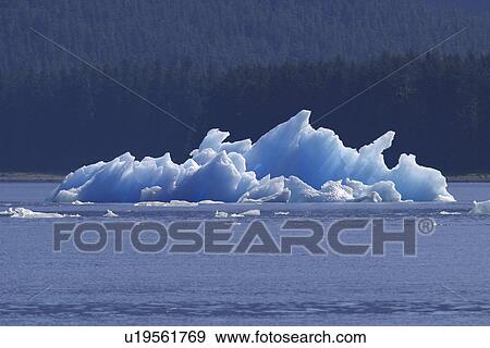 Stock Photo - Iceberg calved off Sawyer Glacier in Tracy Arm, Southeast Alaska, USA. Pacific Ocean.. Fotosearch