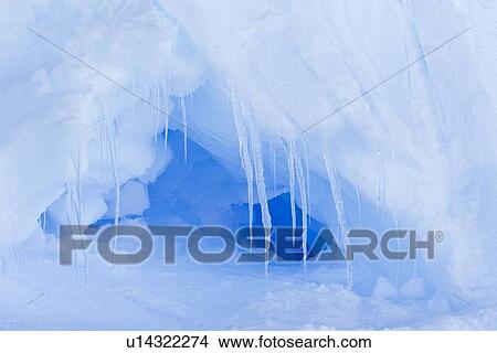 Iceberg detail in and around the Antarctic Peninsula during the summer months. More icebergs are being created as global warming is causing the breakup of major ice shelves and glaciers. View Large Photo Image Picture - Iceberg detail in and around the Antarctic Peninsula during the summer months. More icebergs are being created as global warming is causing the breakup of major ice shelves and glaciers.. Fotosearch