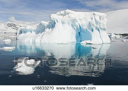 Iceberg detail in and around the Antarctic Peninsula during the summer months. More icebergs are being created as global warming is causing the breakup of major ice shelves and glaciers. View Large Photo Image Stock Image - Iceberg detail in and around the Antarctic Peninsula during the summer months. More icebergs are being created as global warming is causing the breakup of major ice shelves and glaciers.. Fotosearch