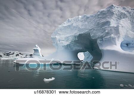 Stock Image - Iceberg detail in and around the Antarctic Peninsula during the summer months. More icebergs are being created as global warming is causing the break up of major ice sheets.. Fotosearch