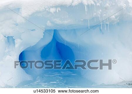 Iceberg detail in and around the Antarctic Peninsula during the summer months. More icebergs are being created as global warming is causing the breakup of major ice shelves and glaciers. View Large Photo Image Stock Photography - Iceberg detail in and around the Antarctic Peninsula during the summer months. More icebergs are being created as global warming is causing the breakup of major ice shelves and glaciers.. Fotosearch