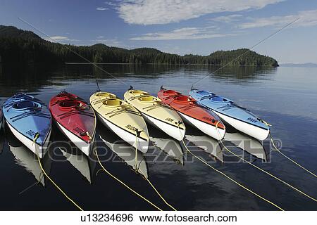 Stock Photograph - Kayaks at anchorage in Southeast Alaska. Property Released by owner Dan Blanchard, American Safari Cruises.. Fotosearch