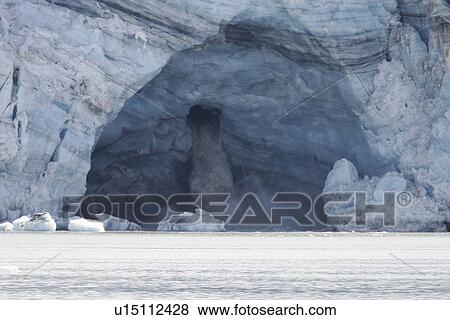 Lamplugh Glacier showing melt water cave, Glacier Bay National Park, Southeast Alaska, USA. View Large Photo Image Stock Photo - Lamplugh Glacier showing melt water cave, Glacier Bay National Park, Southeast Alaska, USA.. Fotosearch