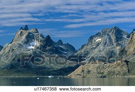 Stock Photo - Mountainous scenery with Inuit settlement "Augpilagtoq". Prins Christian Sund, S-Greenland.. Fotosearch