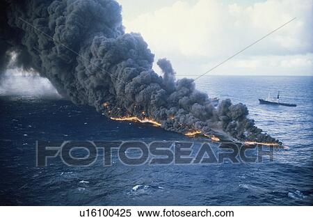 Stock Photography - Oils slick on fire off coast of South Africa (rr). Fotosearch