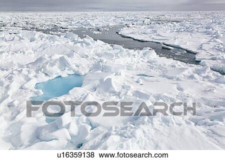 Open leads surrounded by multi-year ice floes in the Barents Sea between EdgeÏya (Edge Island) and Kong Karls Land in the Svalbard Archipelago, Norway. View Large Photo Image Stock Photo - Open leads surrounded by multi-year ice floes in the Barents Sea between EdgeÏya (Edge Island) and Kong Karls Land in the Svalbard Archipelago, Norway.. Fotosearch