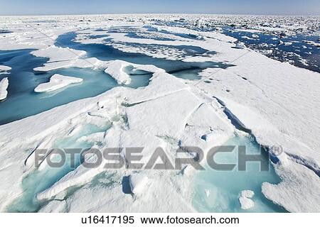 Stock Photography - Open leads surrounded by multi-year ice floes in the Barents Sea between EdgeÏya (Edge Island) and Kong Karls Land in the Svalbard Archipelago, Norway.. Fotosearch