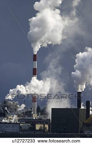 Paper pulp mill spewing smoke from processing plant on the Campbell River on Vancouver Island, British Columbia, Canada. View Large Photo Image Stock Image - Paper pulp mill spewing smoke from processing plant on the Campbell River on Vancouver Island, British Columbia, Canada.. Fotosearch