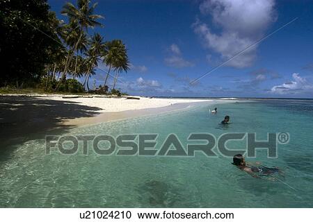 People enjoy the sheltered island beach in Truk lagoon, Chuuk, Federated States of Micronesia, Pacific View Large Photo Image Stock Image - People enjoy the sheltered island beach in Truk lagoon, Chuuk, Federated States of Micronesia, Pacific. Fotosearch