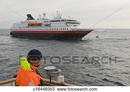 Stock Image - Rescue operation for sinking ship in Antarctica.. Fotosearch