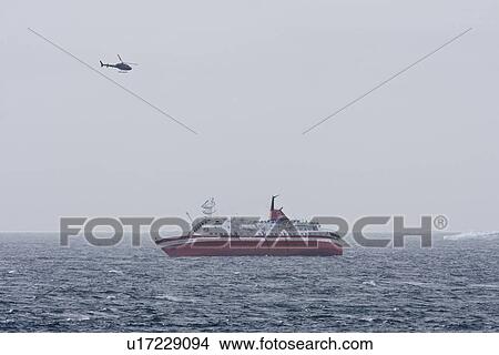Picture - Rescue operation for sinking ship MV Explorer in Antarctica.. Fotosearch