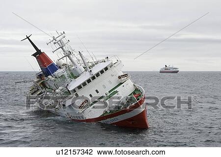 Stock Image - Rescue operation for sinking ship MV Explorer in Antarctica.. Fotosearch