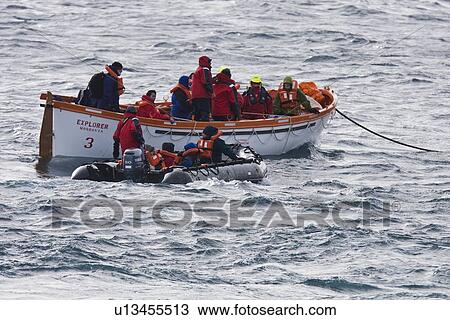 Rescue operation for sinking ship MV Explorer in Antarctica. View Large Photo Image Stock Image - Rescue operation for sinking ship MV Explorer in Antarctica.. Fotosearch