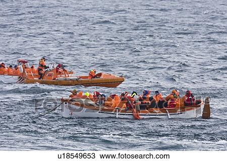 Stock Image - Rescue operation for sinking ship MV Explorer in Antarctica.. Fotosearch