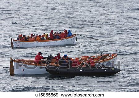 Rescue operation for sinking ship MV Explorer in Antarctica. View Large Photo Image Stock Photo - Rescue operation for sinking ship MV Explorer in Antarctica.. Fotosearch