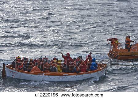 Rescue operation for sinking ship MV Explorer in Antarctica. View Large Photo Image Stock Photograph - Rescue operation for sinking ship MV Explorer in Antarctica.. Fotosearch