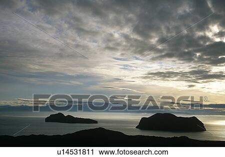Silhouette of islands and Iceland in the background. Heimaey, Western islands, Iceland View Large Photo Image Stock Image - Silhouette of islands and Iceland in the background. Heimaey, Western islands, Iceland. Fotosearch