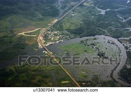 Small town surrounded by flooded tropical rain forest, aerial view, Amazonas, Brazil View Large Photo Image Stock Image - Small town surrounded by flooded tropical rain forest, aerial view, Amazonas, Brazil. Fotosearch