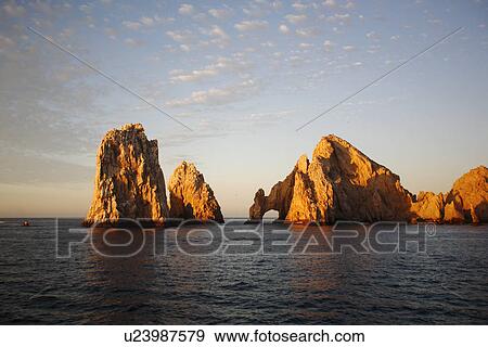 Sunrise on the famous finisterra (land's end) rock formation in Cabo San Lucas, Baja California Sur, Mexico. View Large Photo Image Stock Photo - Sunrise on the famous finisterra (land's end) rock formation in Cabo San Lucas, Baja California Sur, Mexico.. Fotosearch